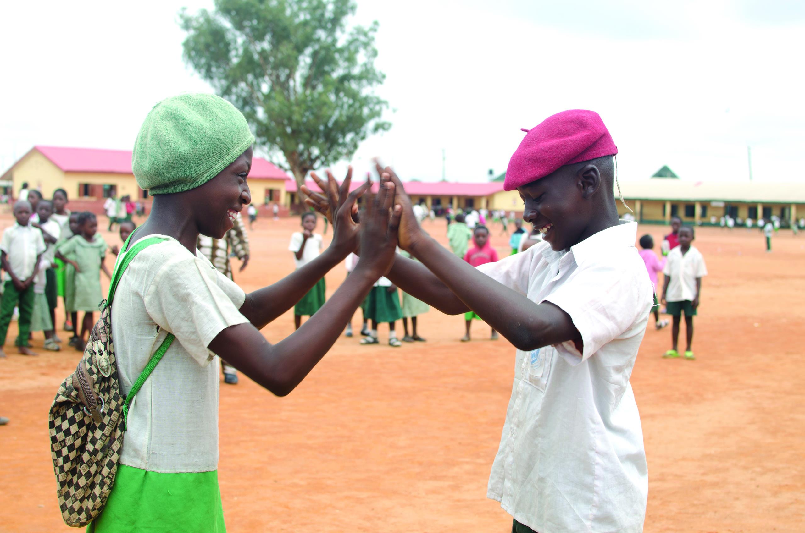 Smiling children playing in Nigeria