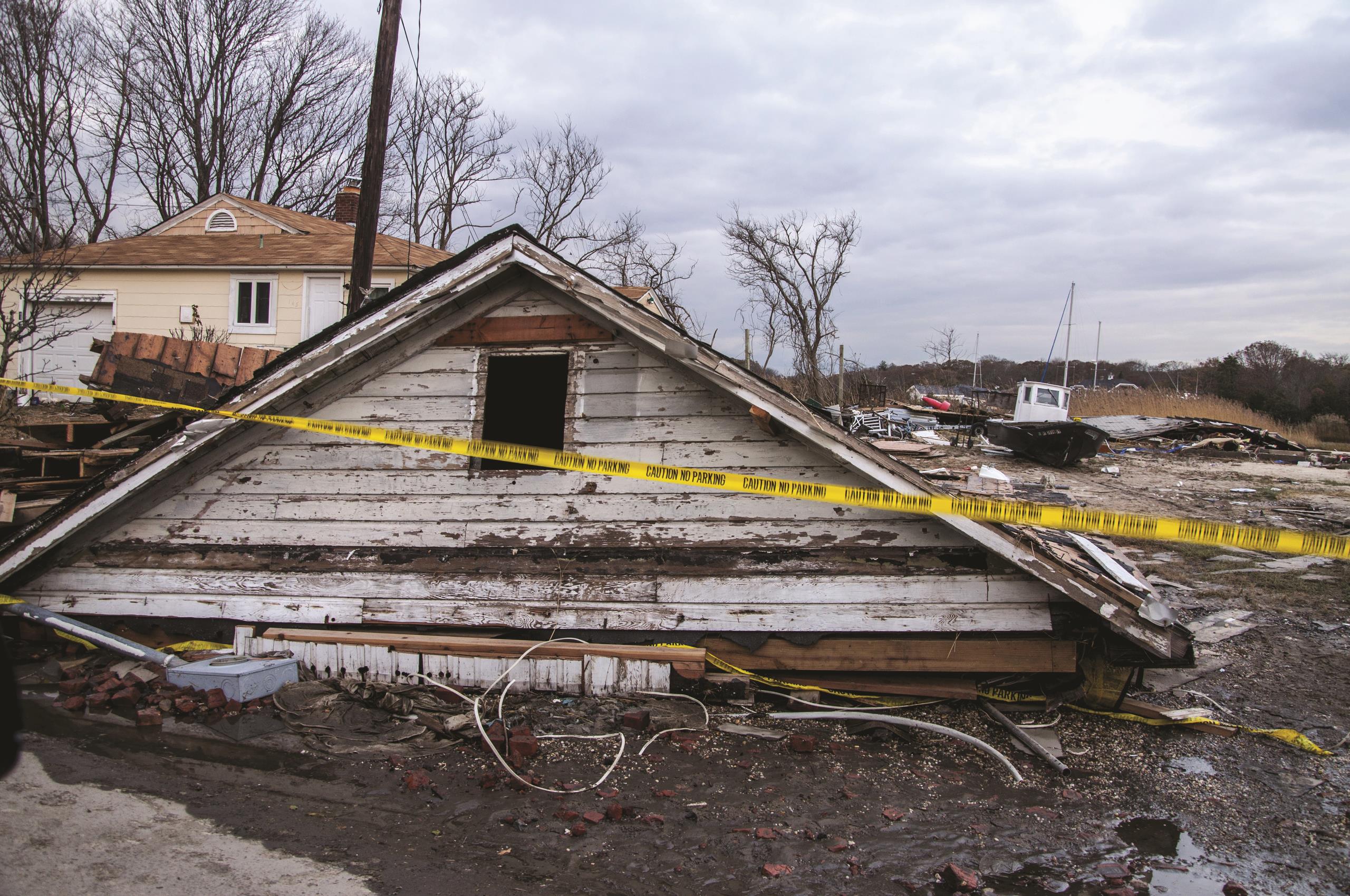 A house's roof that has been ripped off by Hurricane Sandy