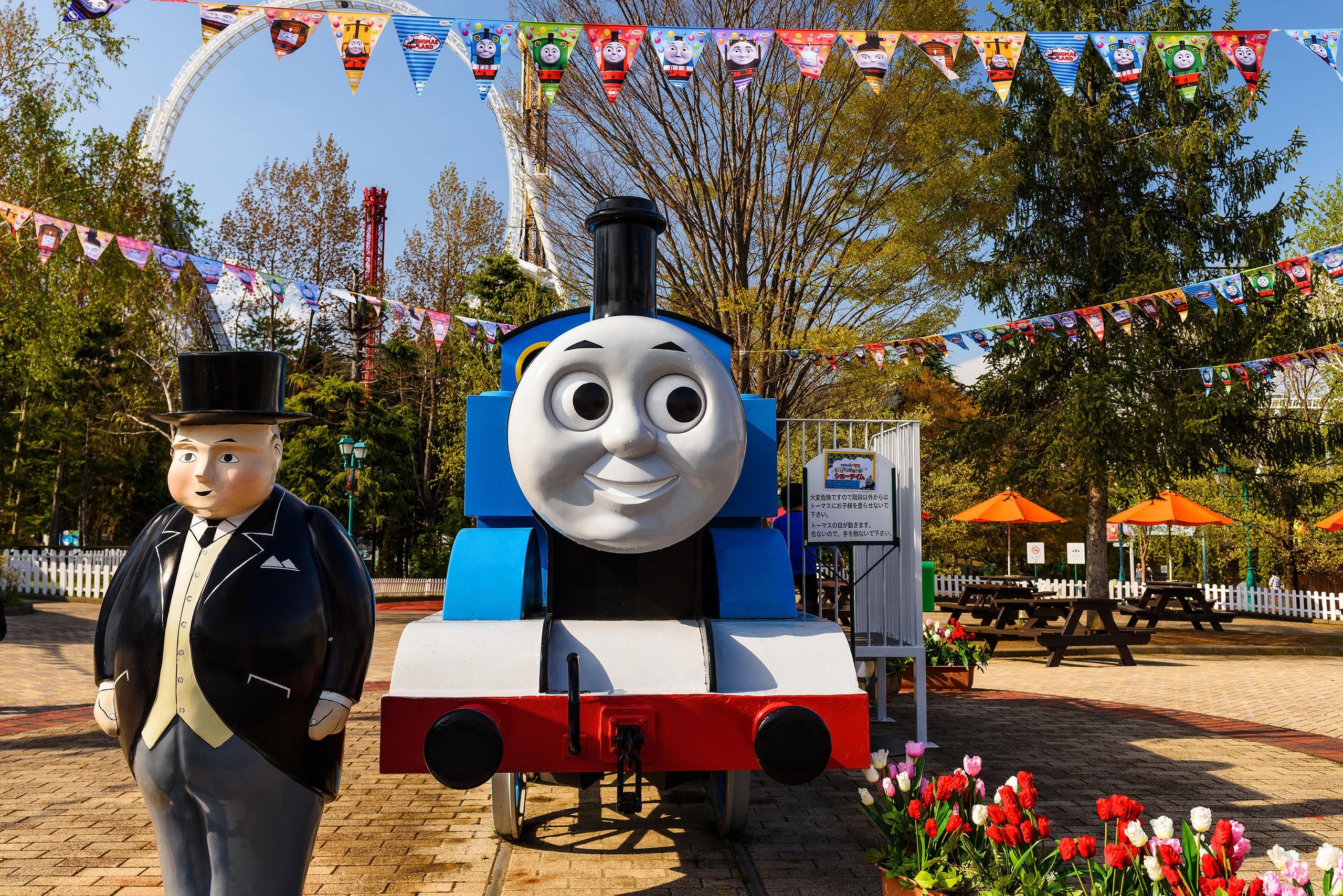 Thomas the tank engine and Fat Controller monuments at Thomas land theme park in Fuji-Q Highland amusement park.