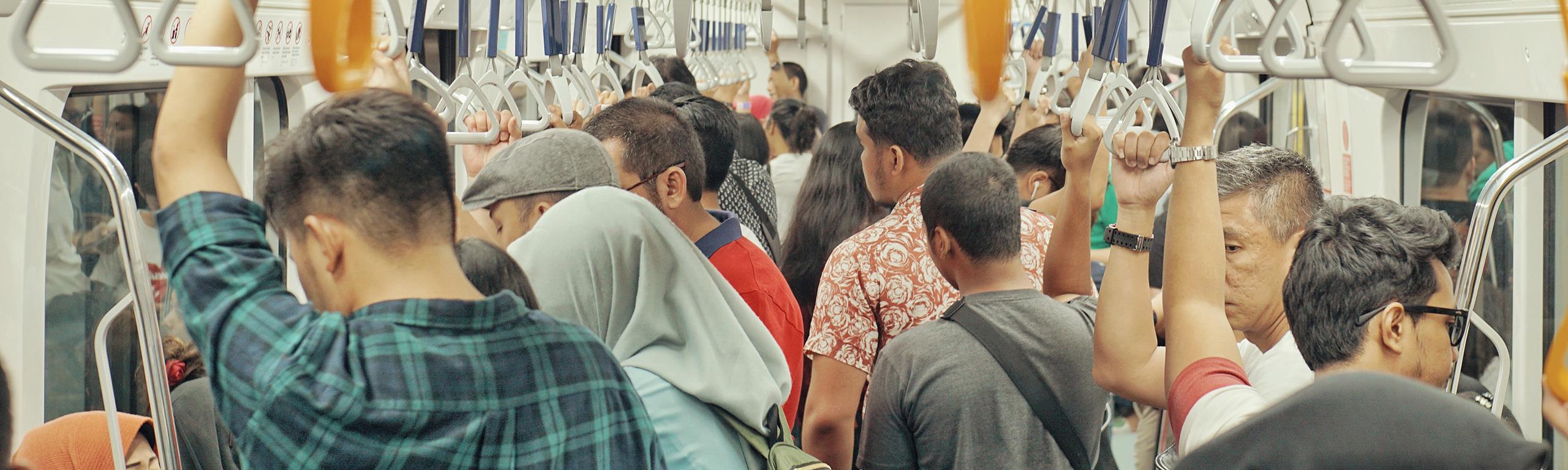 Passengers travelling on a train as part of the MRT line.