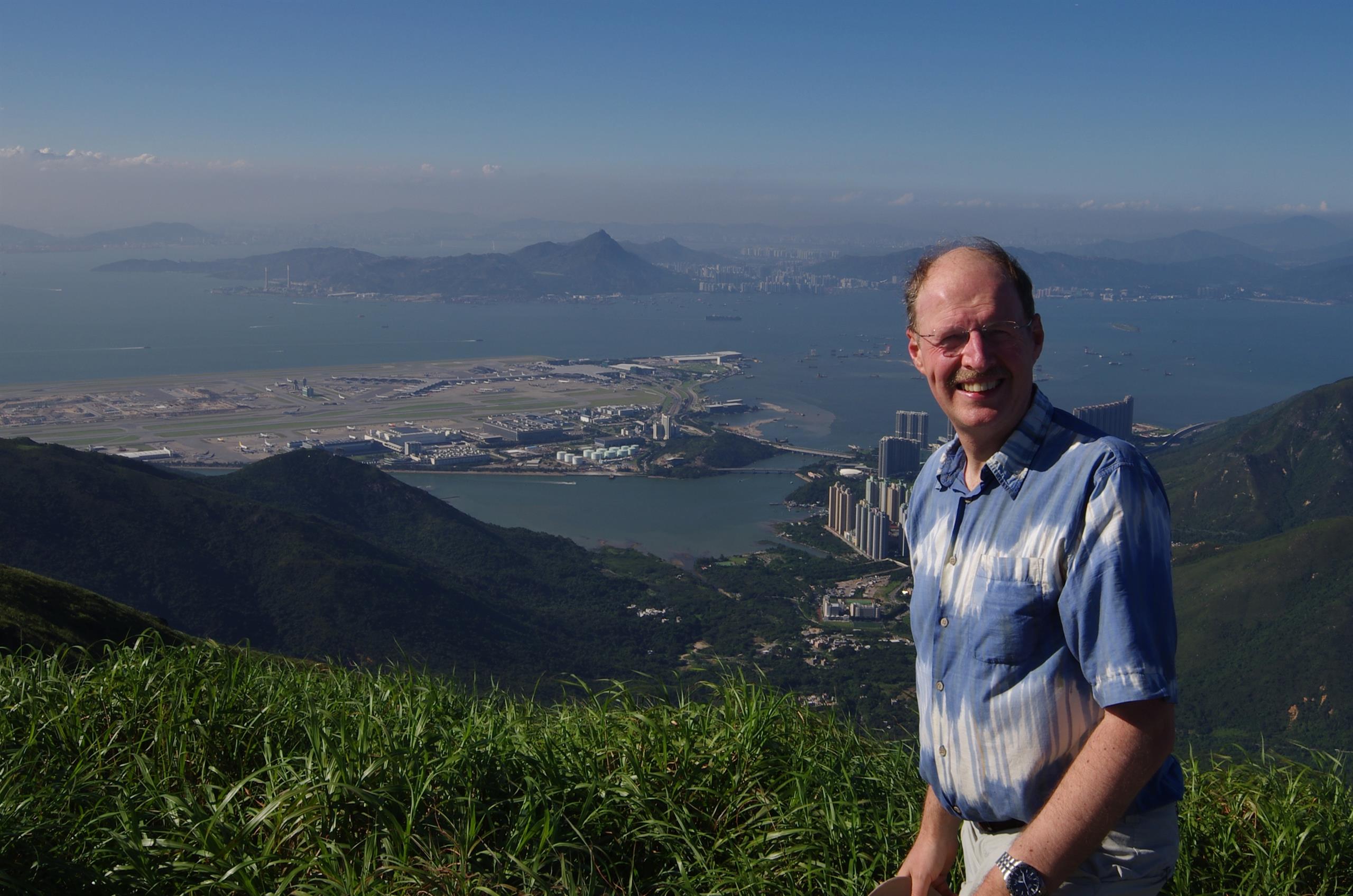Chris with Hong Kong airport in the background
