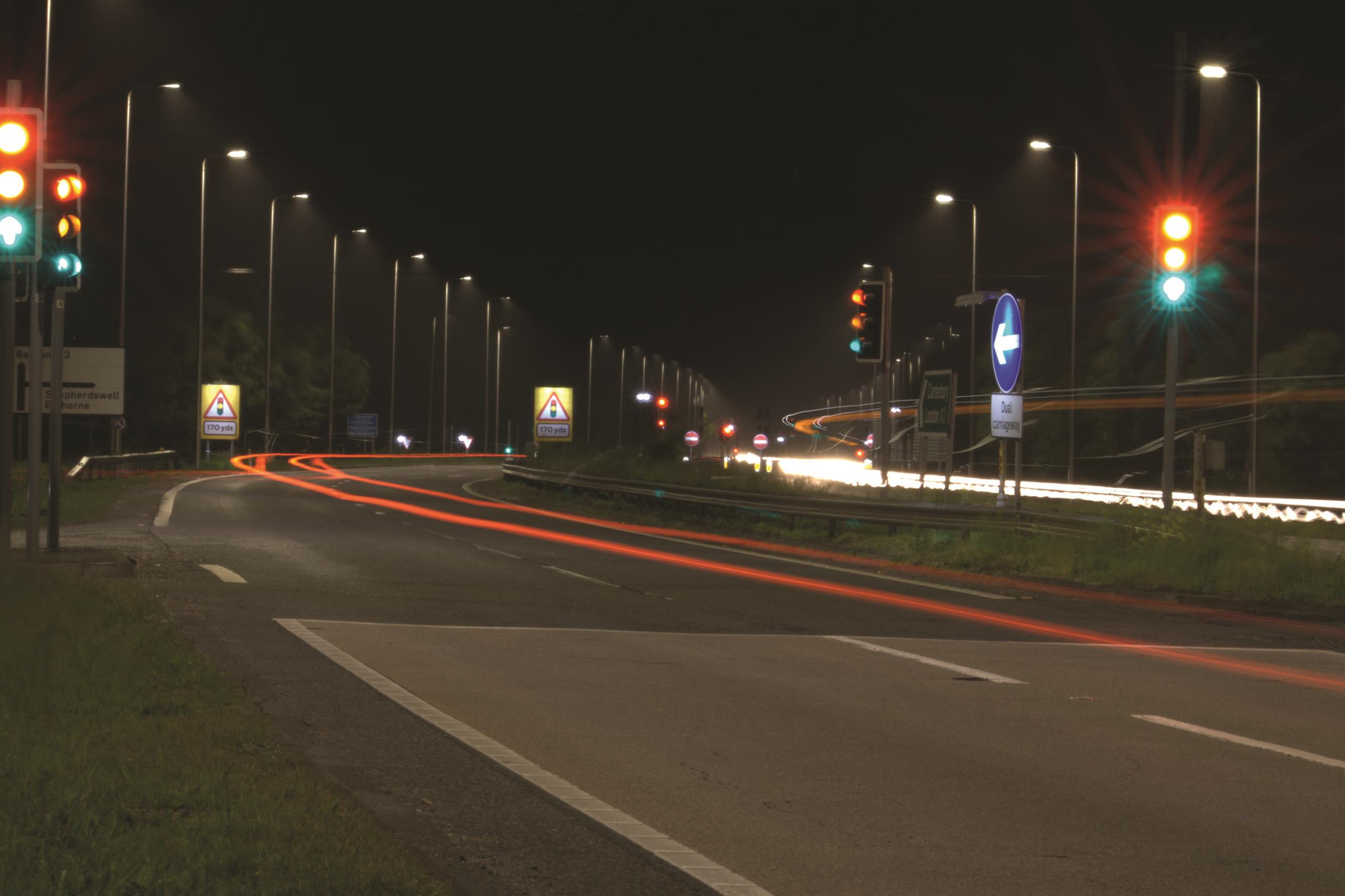 A route lit up on the highway at night