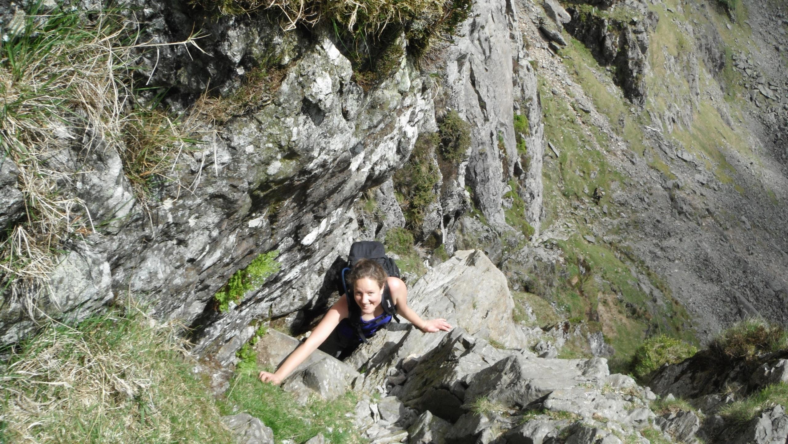 Hannah scrambling up Jack's Rake in the Lake District
