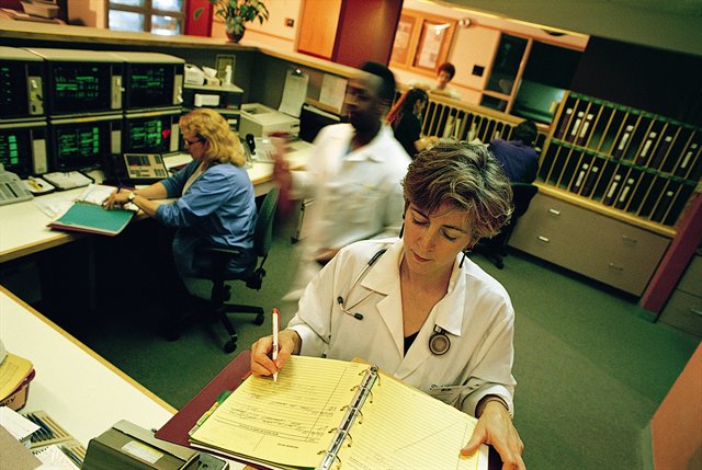 View of nurses at workstation