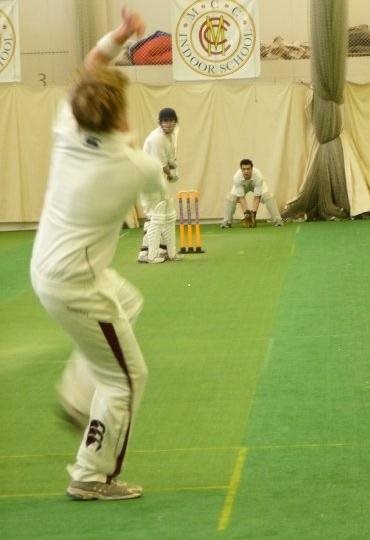 Bowling in the national indoor 6 a side cricket final at Lords