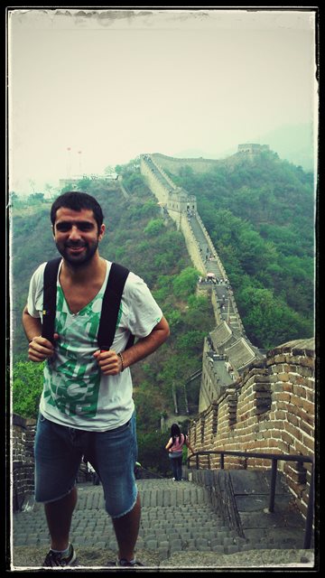 Gerardo walking the Great Wall of China.