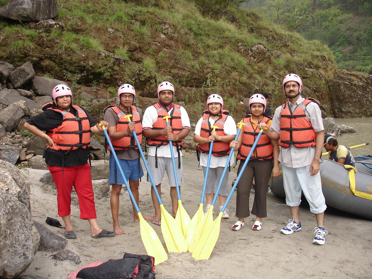 Pooja white water rafting with colleagues and family at Rishikesh.